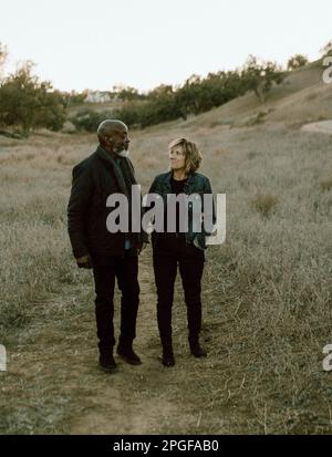 Interracial married couple holding hands Stock Photo