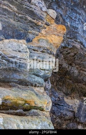 Erosded sandstone cliffs of the Munising Formation near Munising Falls, Pictured Rocks National Lakeshore, Upper Peninsula, Michigan, USA Stock Photo