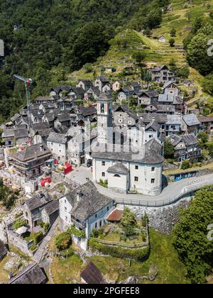 Aerial image with drone of the mountain village Corippo - the smallest commune in Canton Ticino, Switzerland Stock Photo
