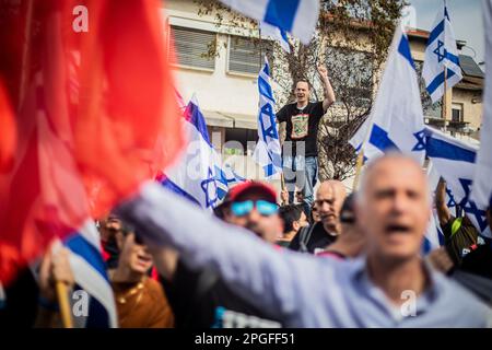 Tel Aviv, Israel. 22nd Mar, 2023. Protestors chant slogans during an anti Judicial reform protest. Protests against the government's judicial overhaul took place in Jerusalem and Tel Aviv with several targeting government ministers as the coalition pushed ahead with its controversial plans. Credit: SOPA Images Limited/Alamy Live News Stock Photo