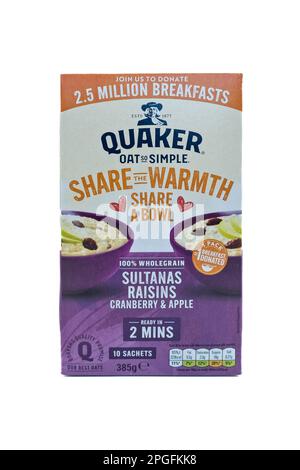 Irvine, Scotland, UK-March 12, 2023: A box of Quaker branded Oat so simple porridge oats in a recyclable cardboard box and paper sachets displaying Kc Stock Photo