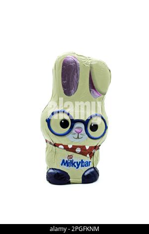 Irvine, Scotland, UK-March 20, 2023: Nestle branded white chocolate Easter themed bunny covered in foil that is recyclable and displaying the Nestle M Stock Photo