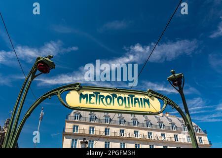 Paris, France - August 30, 2019 : Illustration picture shows a sign with the subway logo (red symbol) in front of a parisian metro (metropolitain) sta Stock Photo