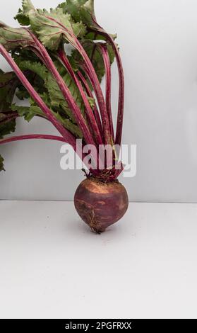 Front view of fresh beetroot and leaves on isolated white background. Stock Photo