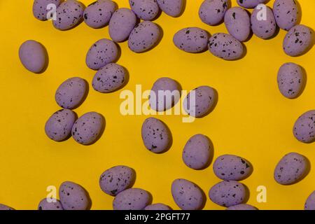 Easter eggs on the yellow background, creative design Stock Photo