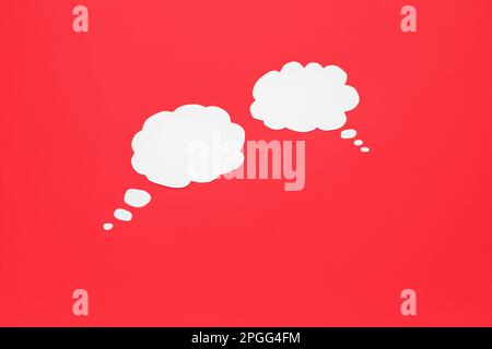 Blank speech bubbles on red background Stock Photo