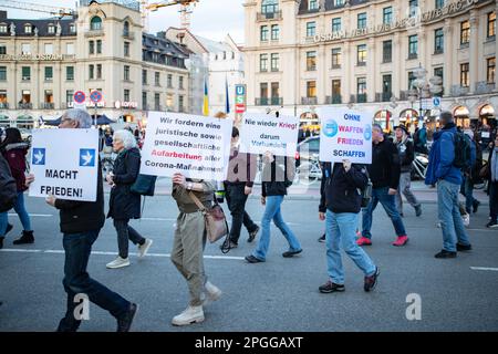 Munich, Germany. 22nd Mar, 2023. Hundreds of people gathered in Munich on March 22, 2023, to demonstrate for a supposed clarification of the pandemic, partly for a surrender of Ukraine, against all arms deliveries and a removal of the German government. Among them were predominantly Covid deniers, Reichsbuerger ( sovereign citizens ) and Putinists. (Photo by Alexander Pohl/Sipa USA) Credit: Sipa USA/Alamy Live News Stock Photo