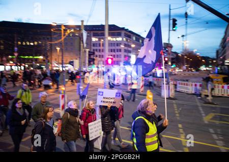 Munich, Germany. 22nd Mar, 2023. Hundreds of people gathered in Munich on March 22, 2023, to demonstrate for a supposed clarification of the pandemic, partly for a surrender of Ukraine, against all arms deliveries and a removal of the German government. Among them were predominantly Covid deniers, Reichsbuerger ( sovereign citizens ) and Putinists. (Photo by Alexander Pohl/Sipa USA) Credit: Sipa USA/Alamy Live News Stock Photo