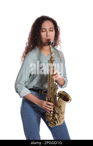 Beautiful African American woman playing saxophone on white background Stock Photo