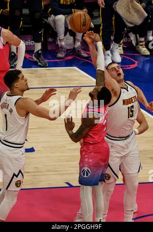 Washington, USA. 22nd Apr, 2023. WASHINGTON, DC - MARCH 22: Denver Nuggets center Nikola Jokic (15) and Washington Wizards guard Monte Morris (22) go for a rebound during a NBA game between the Washington Wizards and the Denver Nuggets, on March 22, 2023, at Capital One Arena, in Washington, DC. (Photo by Tony Quinn/SipaUSA) Credit: Sipa USA/Alamy Live News Stock Photo