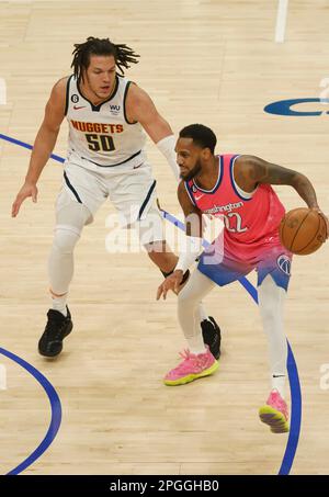 Washington, USA. 22nd Apr, 2023. WASHINGTON, DC - MARCH 22: Denver Nuggets forward Aaron Gordon (50) guards against Washington Wizards guard Monte Morris (22) during a NBA game between the Washington Wizards and the Denver Nuggets, on March 22, 2023, at Capital One Arena, in Washington, DC. (Photo by Tony Quinn/SipaUSA) Credit: Sipa USA/Alamy Live News Stock Photo