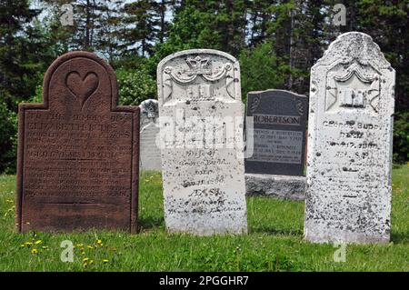 Headstones dating from the 19th Century in the cemetery at Cavendish, Prince Edward Island. Stock Photo