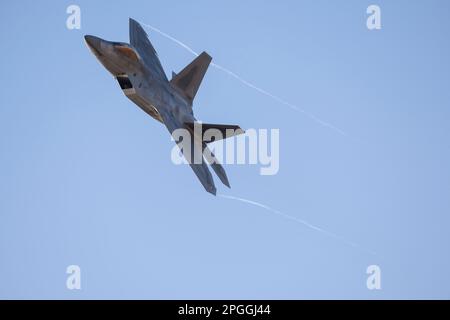 Las Vegas, NV - November 5, 2022: USAF F-22 Fighter Jet Banks Left After Take-Off During the Red Flag 23-1 Exercise at Nellis AFB. Stock Photo