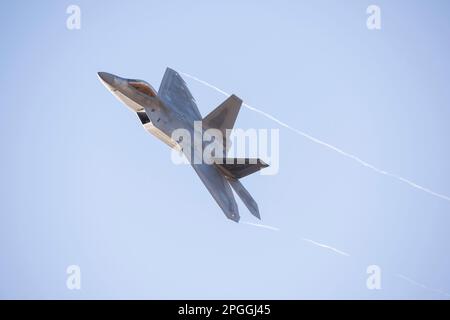 Las Vegas, NV - November 5, 2022: USAF F-22 Fighter Jet Banks Left After Take-Off During the Red Flag 23-1 Exercise at Nellis AFB. Stock Photo
