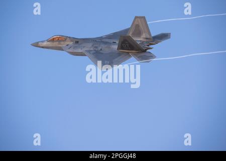 Las Vegas, NV - November 5, 2022: USAF F-22 Fighter Jet Banks Left After Take-Off During the Red Flag 23-1 Exercise at Nellis AFB. Stock Photo