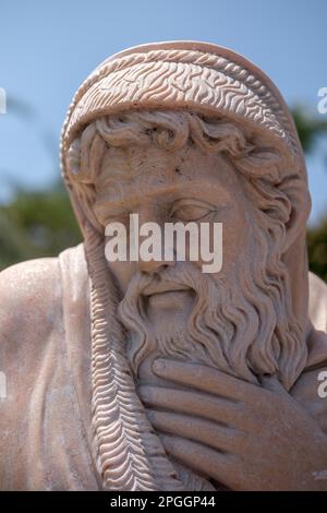 Statue of a man in Puerto Banus Stock Photo