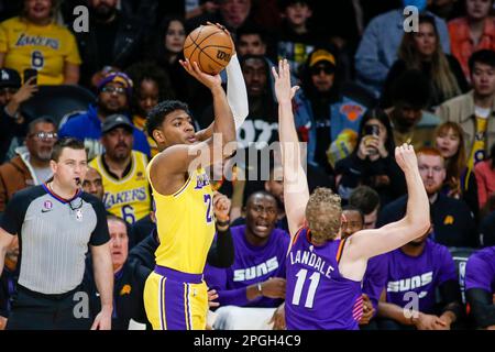 Los Angeles, California, USA. 22nd Mar, 2023. Los Angeles Lakers forward Rui Hachimura (L) shoots against Phoenix Suns center Jock Landale (R) during an NBA basketball game at Crypto.com Arena, Wednesday, March 22, 2023, in Los Angeles. (Credit Image: © Ringo Chiu/ZUMA Press Wire) EDITORIAL USAGE ONLY! Not for Commercial USAGE! Stock Photo