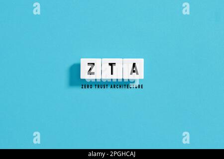White letter blocks on blue background with the acronym ZTA Zero Trust Architecture. network security concept. Stock Photo