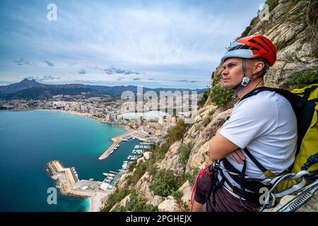 Trad rock climbing in Penyal d'Ifac National Park at Calp near Alicante, Spain Stock Photo