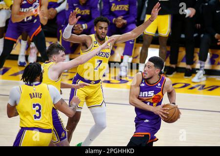 Los Angeles, United States. 22nd Mar, 2023. Phoenix Suns guard Devin Booker (R) in action during an NBA basketball game between Los Angeles Lakers and Phoenix Suns at Crypto.com Arena. Final score; Los Angeles Lakers 122: 111 Phoenix Suns. Credit: SOPA Images Limited/Alamy Live News Stock Photo