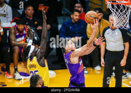 Los Angeles, United States. 22nd Mar, 2023. Phoenix Suns guard Devin Booker (R) in action during an NBA basketball game between Los Angeles Lakers and Phoenix Suns at Crypto.com Arena. Final score; Los Angeles Lakers 122: 111 Phoenix Suns. Credit: SOPA Images Limited/Alamy Live News Stock Photo