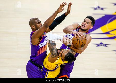 Los Angeles, United States. 22nd Mar, 2023. Los Angeles Lakers guard D'Angelo Russell (C), Phoenix Suns guards Chris Paul (L) and Devin Booker (R) in action during an NBA basketball game between Los Angeles Lakers and Phoenix Suns at Crypto.com Arena. Final score; Los Angeles Lakers 122: 111 Phoenix Suns. (Photo by Ringo Chiu/SOPA Images/Sipa USA) Credit: Sipa USA/Alamy Live News Stock Photo