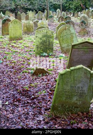 Aging Victorian gravestones in a public Suffolk cemetery Stock Photo