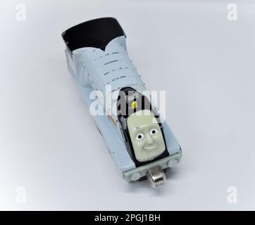 A die cast model of Spencer from the Thomas the Tank Engine series set against a white background Stock Photo