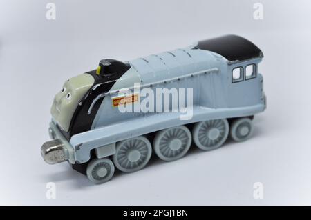 A die cast model of Spencer from the Thomas the Tank Engine series set against a white background Stock Photo