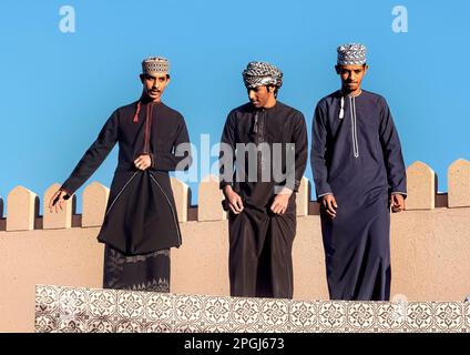 Native Omanis. Nizwa Fort, Nizwa, Oman Stock Photo