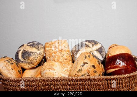 basket with various fresh bread rolls Stock Photo