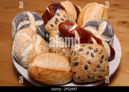dish with various fresh bread rolls Stock Photo