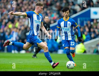 Brighton young striker Evan Ferguson shoots and scores during the Brighton and Hove Albion v Grimsby Town Emirates FA Cup Quarter Final match at the American Express Community Stadium, Brighton 19th March 2023 Stock Photo