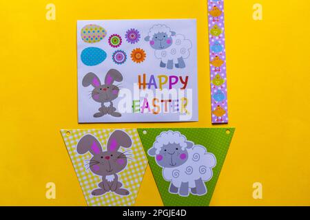 Happy Easter decorations, bunting on yellow background Stock Photo