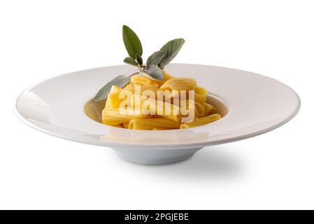 Macaroni rigatoni with butter and sage sauce in white dish with sage leaves, isolated on white, clipping path Stock Photo