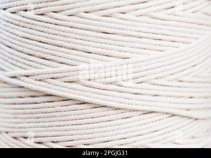 Closeup of a white string rope on a white background, perfect for, White  String 
