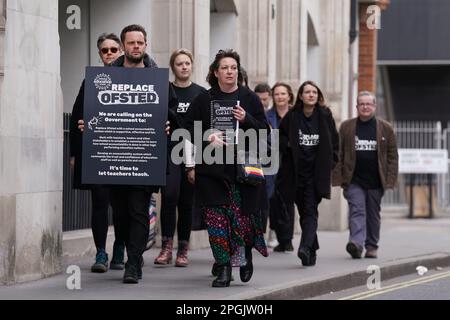 Members of the National Education Union (NEU) hand in a petition which has been signed by 45,000 people to the Department for Education in Westminster, central London. Pressure is mounting on the watchdog as school leaders and unions are calling for urgent reform of the inspection system following the death of Ruth Perry, who took her own life while waiting for a negative Ofsted inspection report. Picture date: Thursday March 23, 2023. Ruth, who was head teacher at Caversham Primary School in Reading, killed herself in January while waiting for an Ofsted report which gave her school the lowest Stock Photo