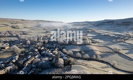 Hawes and the surrounding countryside in Wensleydale, covered in hoar frost early on a cold winters morning. North Yorkshire, UK. Stock Photo