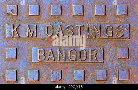 rusting KM Castings Bangor embossed grid, Wales, UK Stock Photo