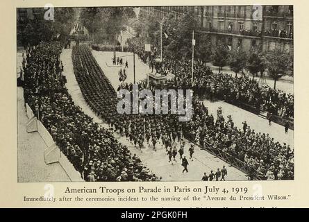 American Troops on Parade in Paris on July 4, 1919 Immediately after the ceremonies incident to the naming of the 'Avenue du President Wilson from the book ' Deeds of heroism and bravery : the book of heroes and personal daring ' by Elwyn Alfred Barron and Rupert Hughes,  Publication Date 1920 Publisher New York : Harper & Brothers Publishers Stock Photo