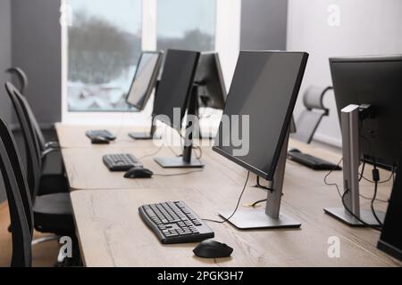 Many modern computers in open space office Stock Photo