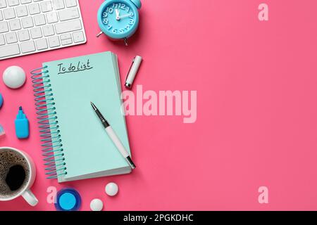 Flat lay composition with unfilled To Do list and cup of coffee on pink background, space for text Stock Photo