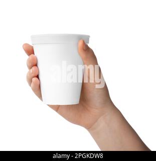 Woman holding styrofoam cup on white background, closeup Stock Photo