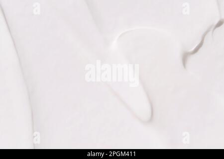 Cosmetic product background. White toothpaste texture. Cleansing face emultion. Milk liquid sunscreen. Closeup hydrating cream. Abstract makeup lotion swatch. Beauty spa foam Stock Photo