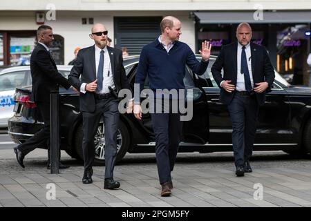 Warsaw, Poland, 23/02/2023, Prince William arrives for a meeting with young Ukrainians working and studying in Poland. Britain's Prince William has made unannounced two-day visit to Poland that has been kept tightly under wraps due to security. During his visit, the Prince of Wales visited the British and Polish troops stationed next to the Ukrainian border, also met with Ukrainian refugees sheltering in Warsaw. On the second day of his visit Prince William talked to President Andrzej Duda at the presidential palace. In the final stop on his two-day visit, William went to a trendy food hall wh Stock Photo