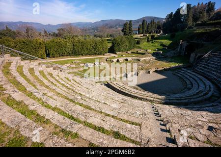 Roman theatre at Fiesole, originally an Etruscan town that overlooks the city of Florence - the bell tower a distinctive landmark on the hill. Stock Photo