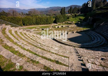 Roman theatre at Fiesole, originally an Etruscan town that overlooks the city of Florence - the bell tower a distinctive landmark on the hill. Stock Photo