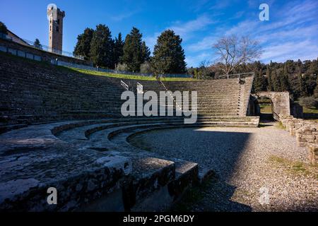 Roman theatre at Fiesole, originally an Etruscan town that overlooks the city of Florence - the bell tower a distinctive landmark on the hill. Stock Photo