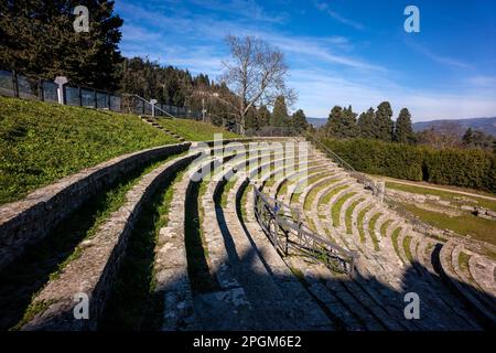 Roman theatre at Fiesole, originally an Etruscan town that overlooks the city of Florence - the bell tower a distinctive landmark on the hill. Stock Photo