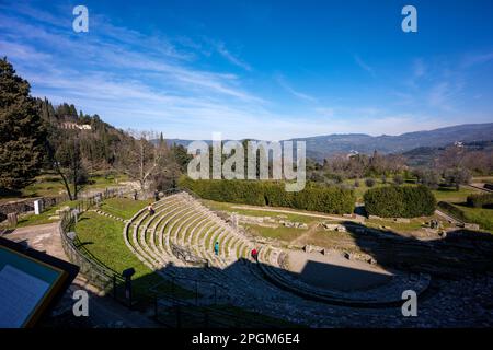 Roman theatre at Fiesole, originally an Etruscan town that overlooks the city of Florence - the bell tower a distinctive landmark on the hill. Stock Photo